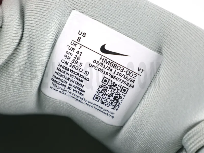Gray tongue with logo.