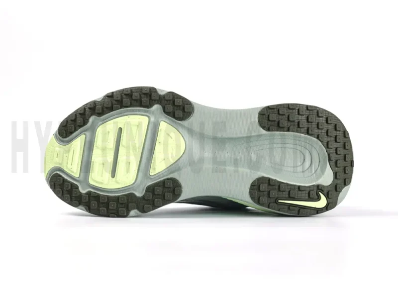 The green gray and black outsole.