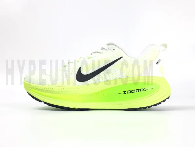 The left of the Nike Vomero 18 'Electric Green' Road Running Shoes