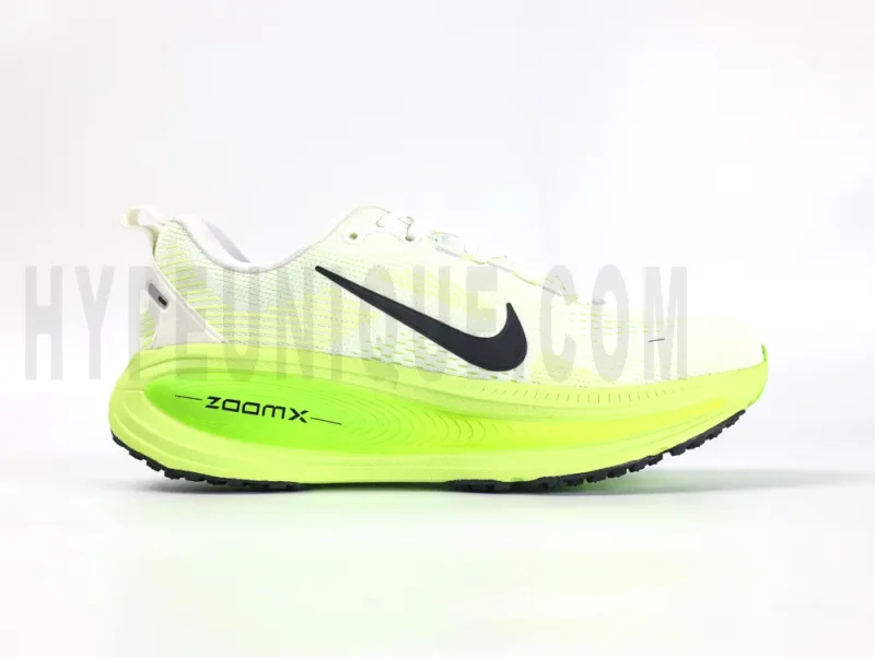 The right of the Nike Vomero 18 'Electric Green' Road Running Shoes