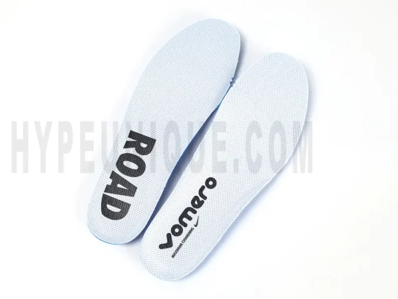 The white insole of the Nike Vomero 18 'Platinum Tint Siren Red' Road Running Shoes.