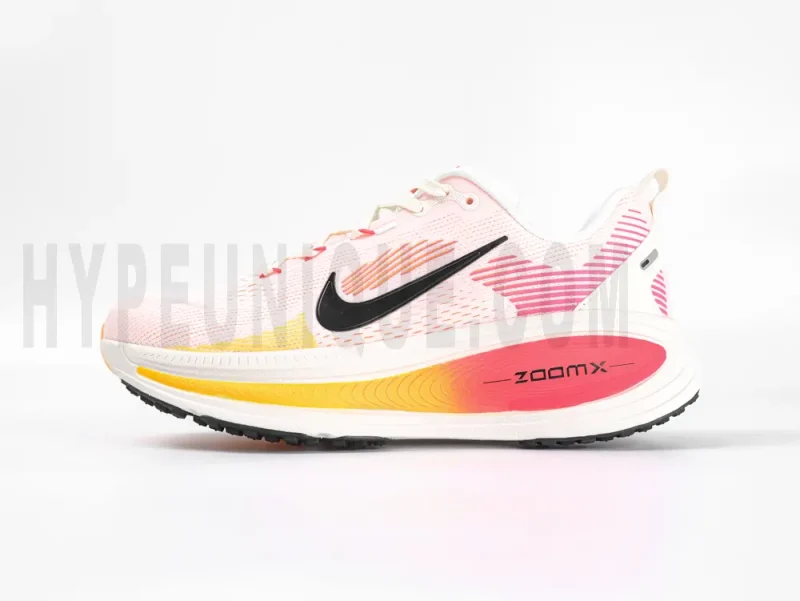 The left of the Nike Vomero 18 GS 'Sail Bright Crimson' Running Shoes.