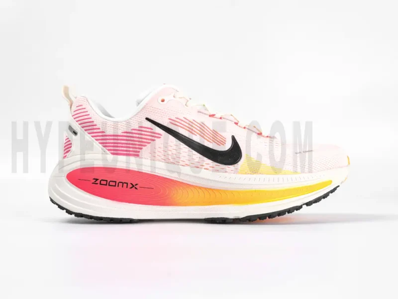 The right of the Nike Vomero 18 GS 'Sail Bright Crimson' Running Shoes.