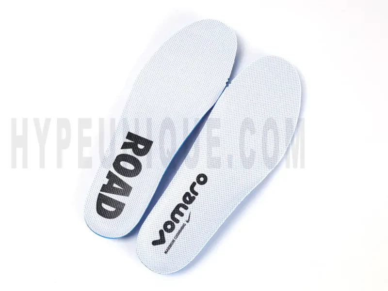The white insole of the Nike Vomero 18 'Platinum Tint Siren Red' Road Running Shoes.