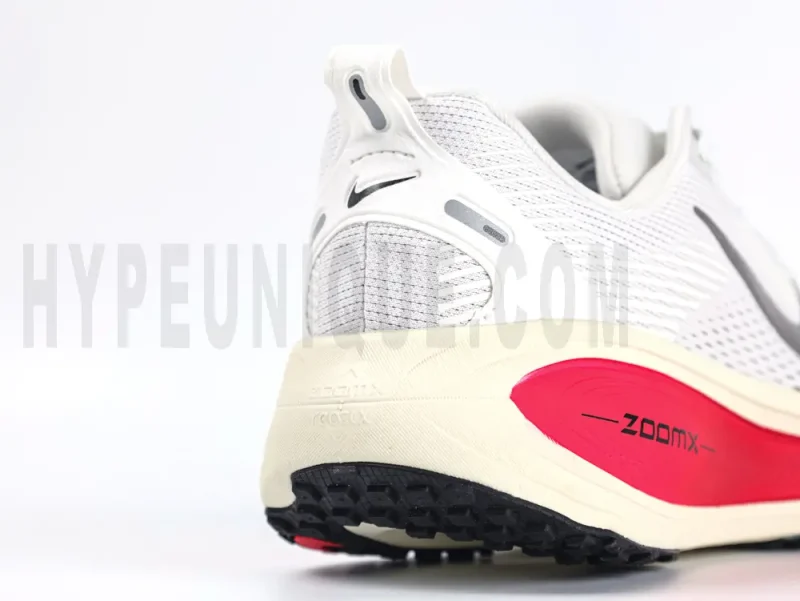 White tongue, black logo.