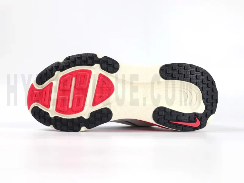 The white red and black outsole.