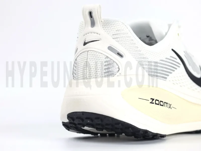 White tongue, black logo.