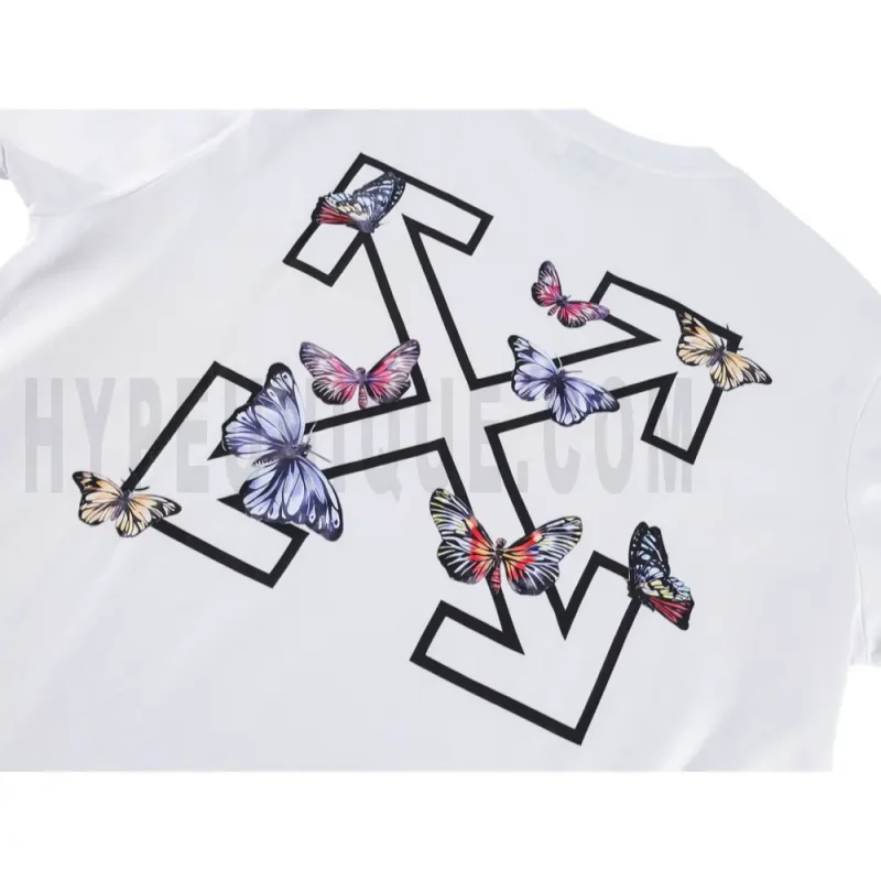 Detailed shot capturing the graphic print on the white tee's back panel.