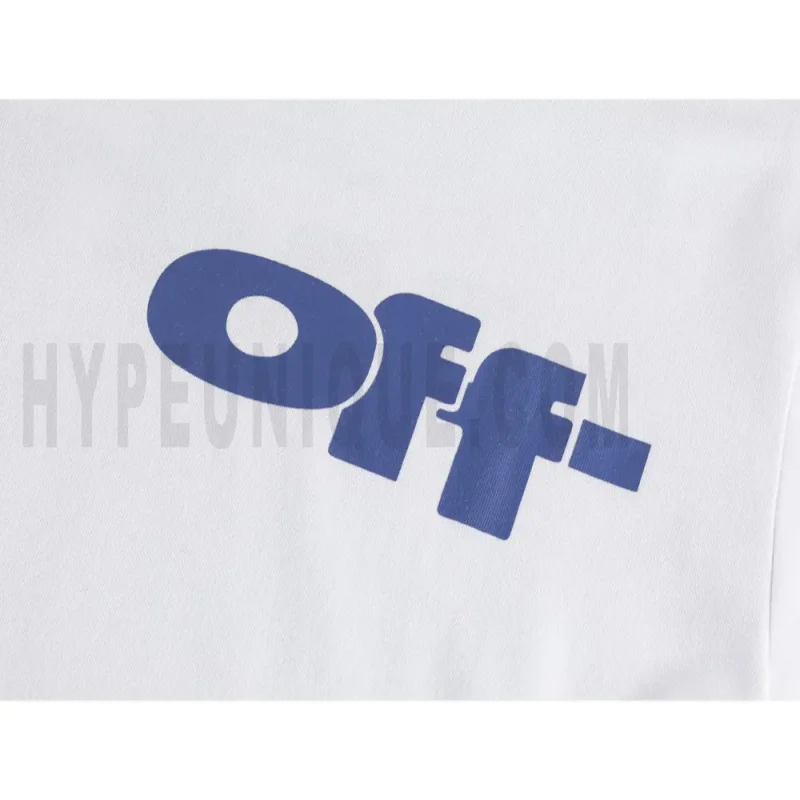 Detailed shot capturing the graphic print on the white tee's front panel.