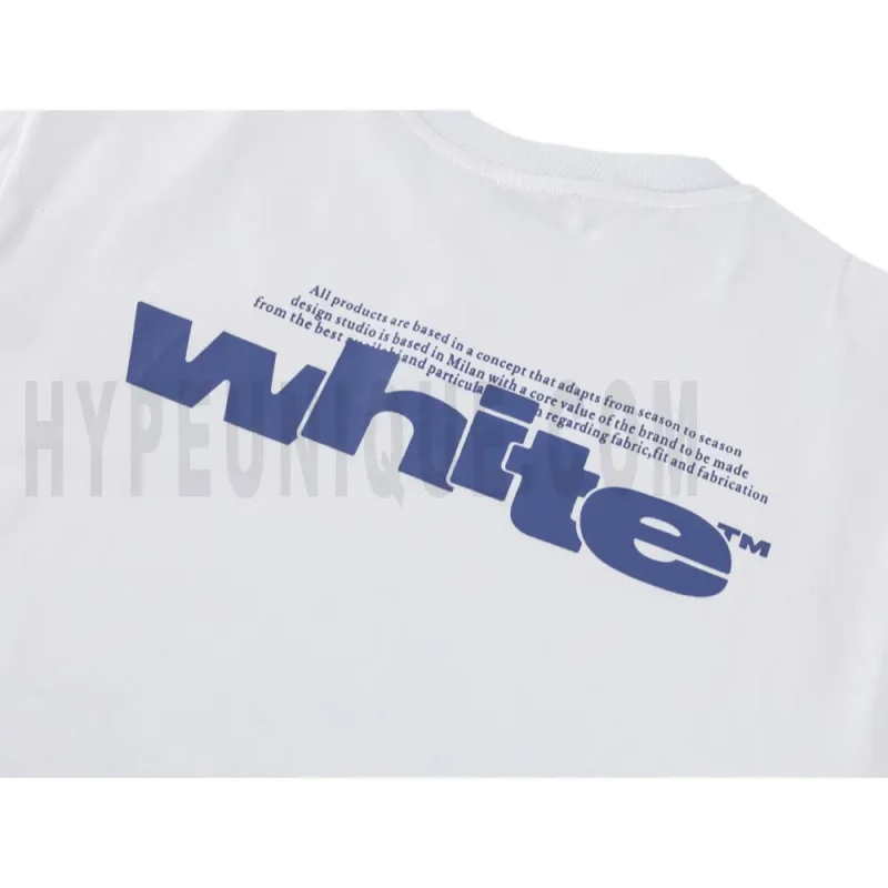 Detailed shot capturing the graphic print on the white tee's back panel.