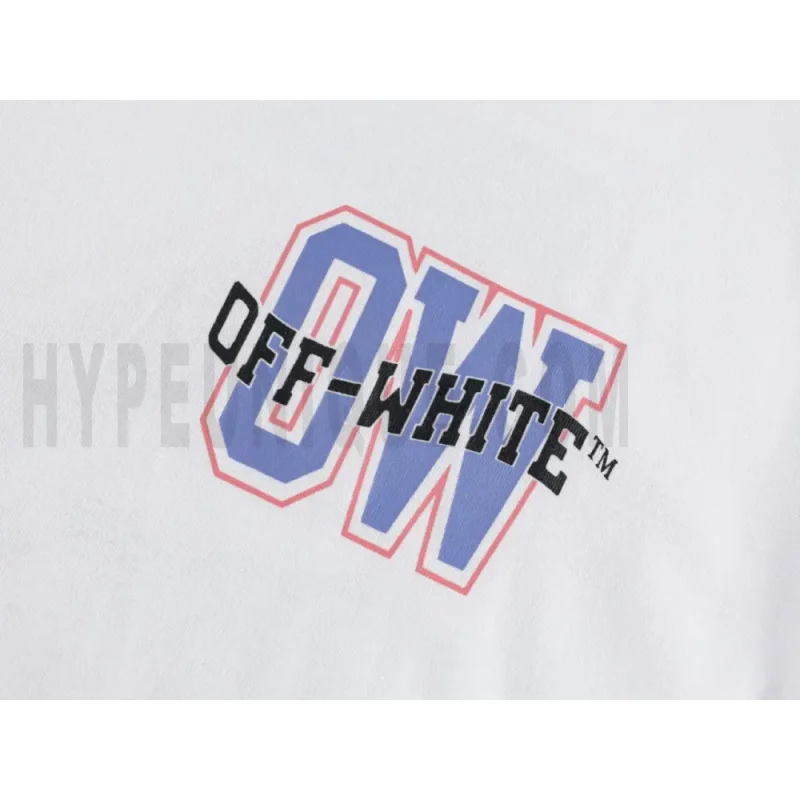 Detailed shot capturing the graphic print on the white tee's front panel.