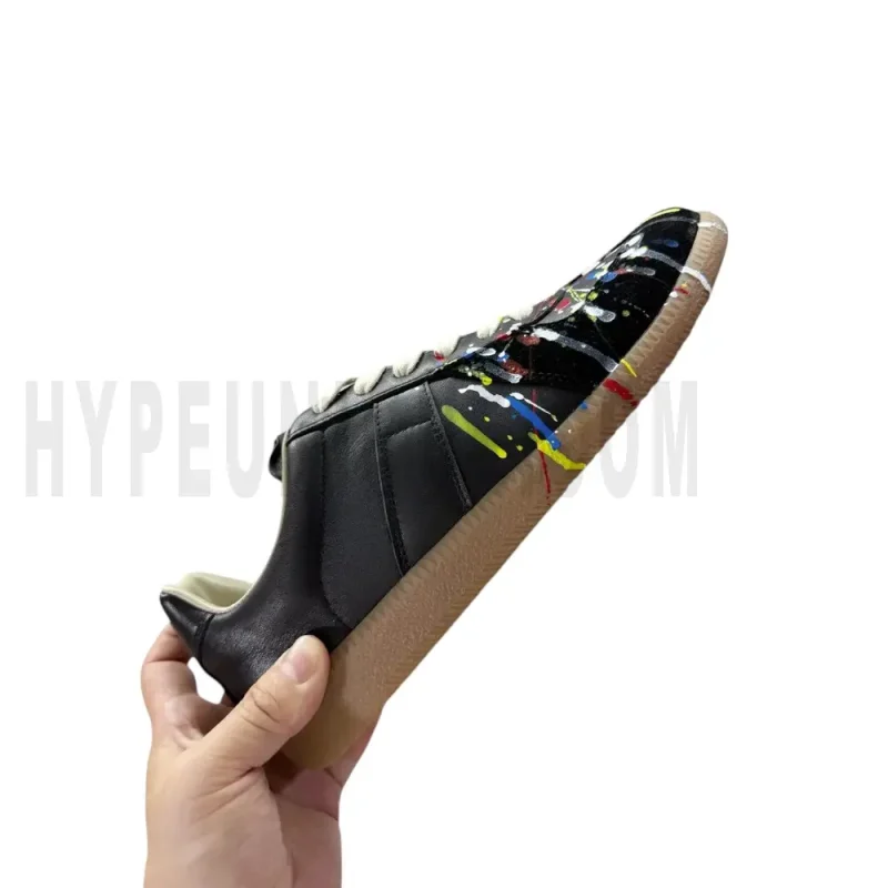 The right side of the black shoes