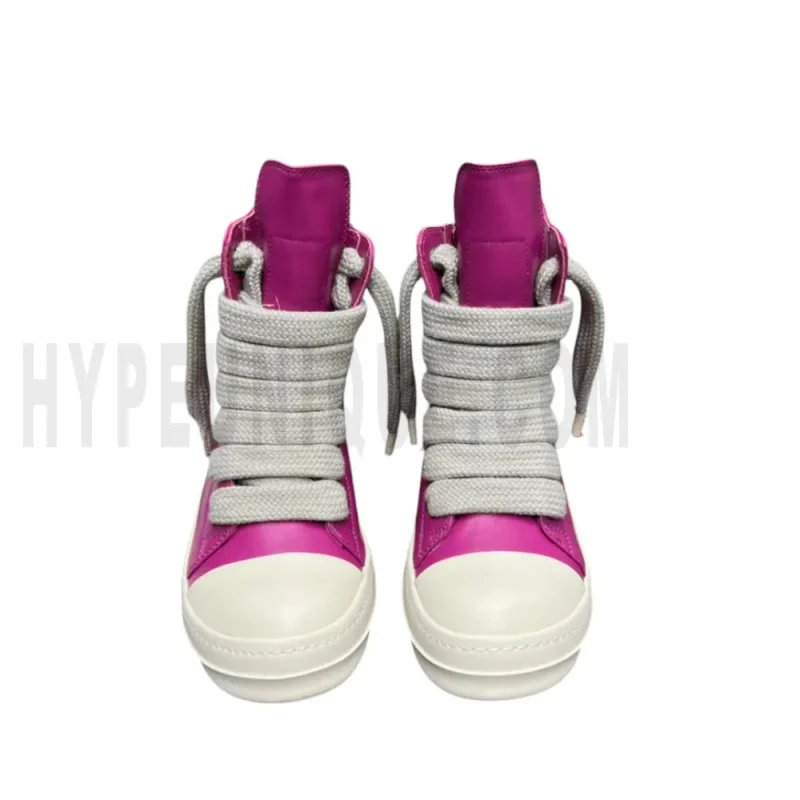 The front of the pink shoes