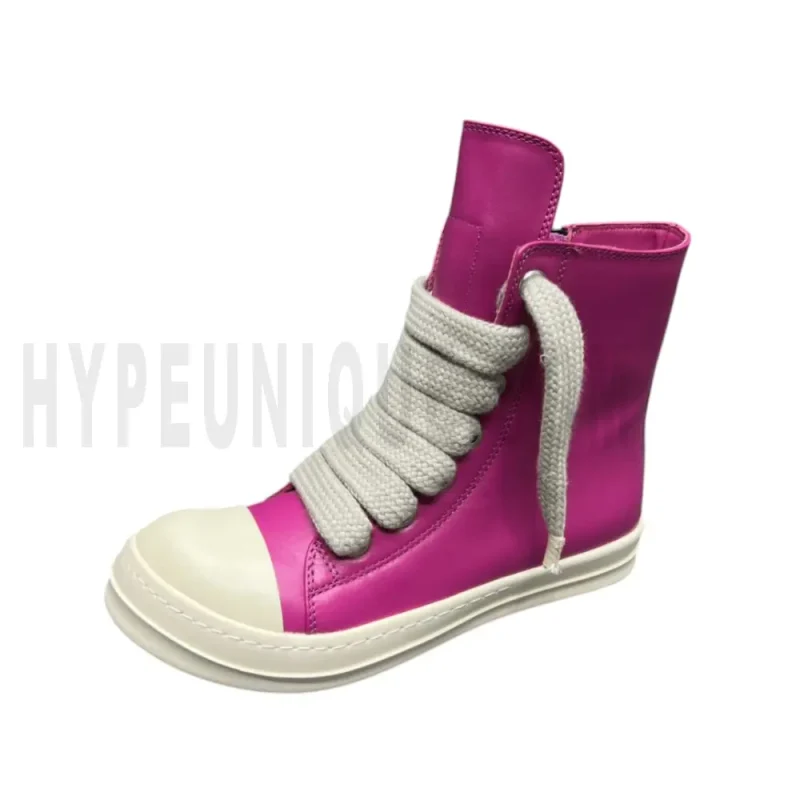 The left of the pink shoes