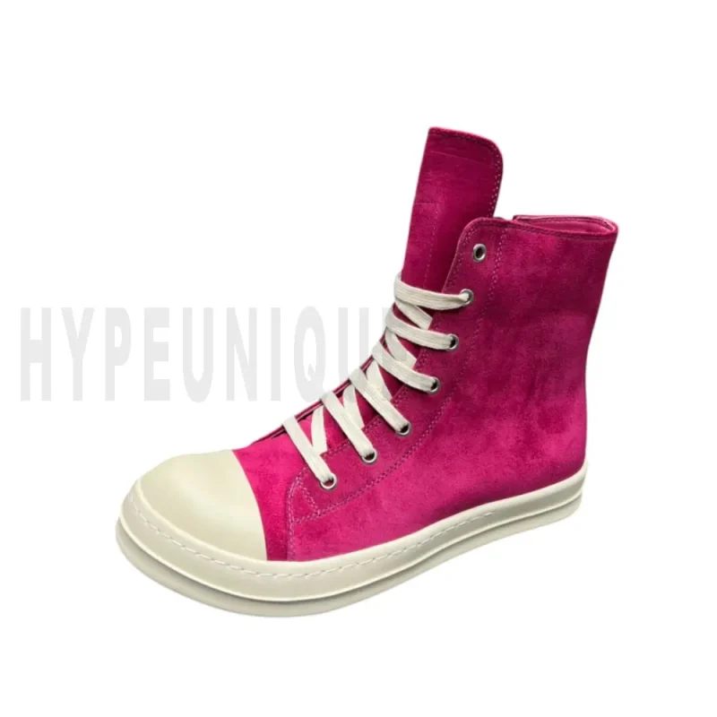 The left of the pink shoes