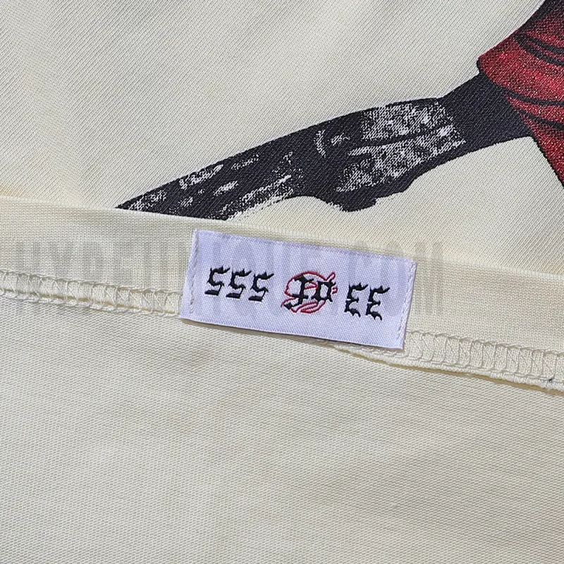 Clean hemline finish with a modern cut, highlighting the T-shirt's streetwear aesthetic.
