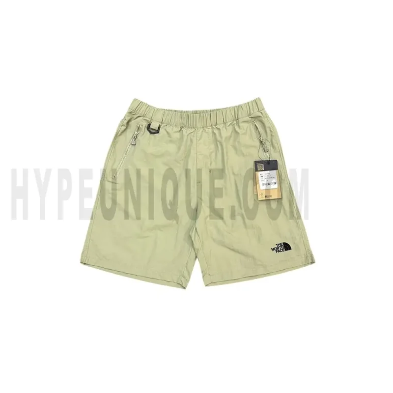 The front of the green short