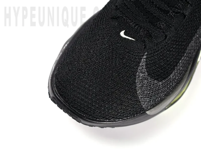 a close up of a black shoelack toe