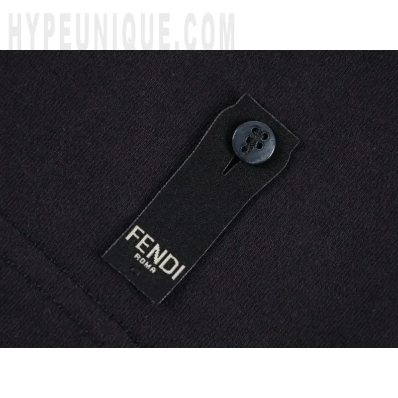Close-up of button detail on the clothes