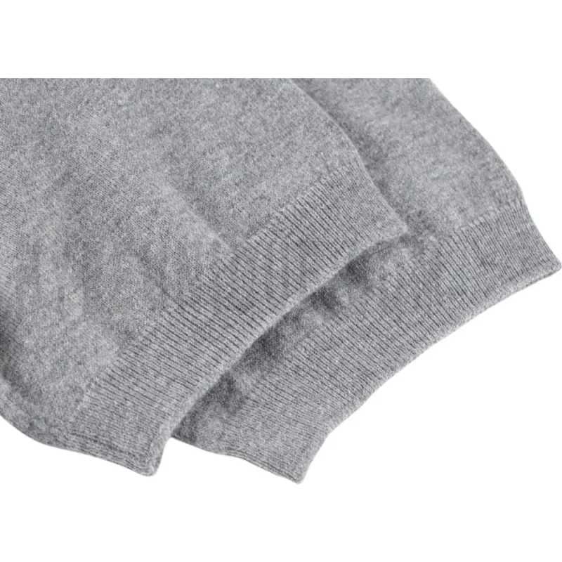 The sleeves of the grey clothes