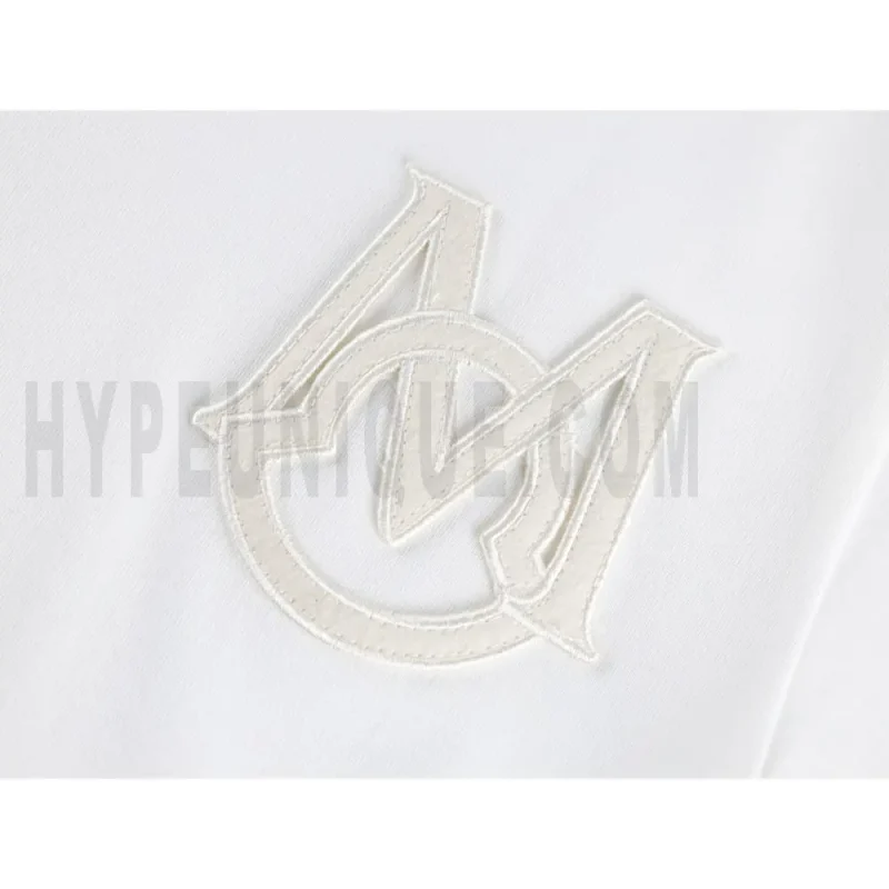 Embroidered graphic on the side of the T-shirt
