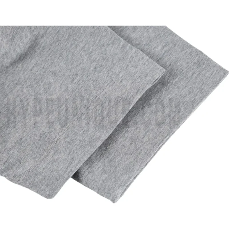 The sleeves of the gray clothes