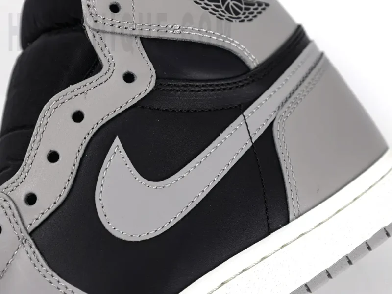 the grey swoosh
