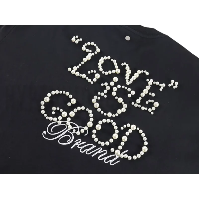 Embroidered graphic on the back of the T-shirt