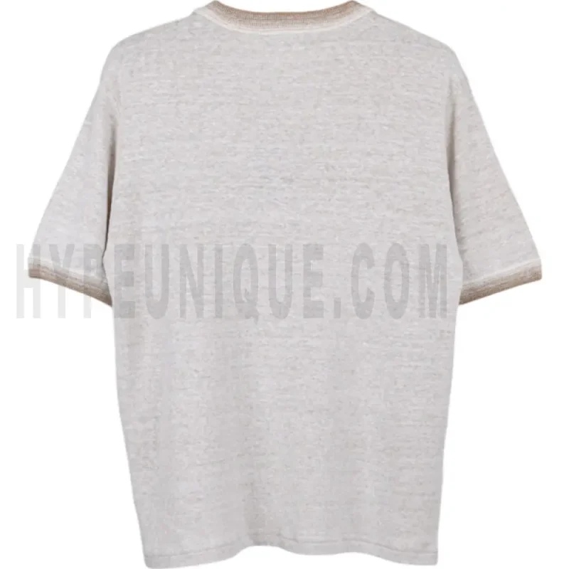 The back of the beige clothes