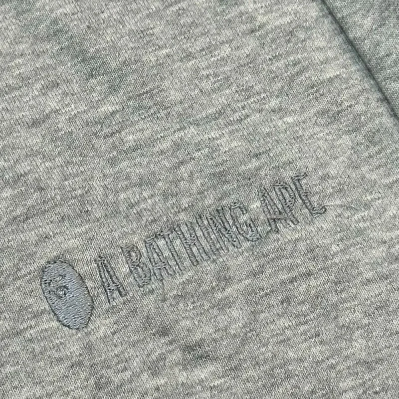 Embroidered graphic on the front of the shorts