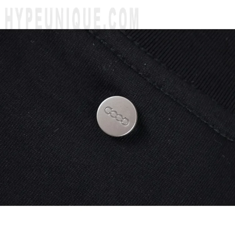Close-up of button detail on the clothes