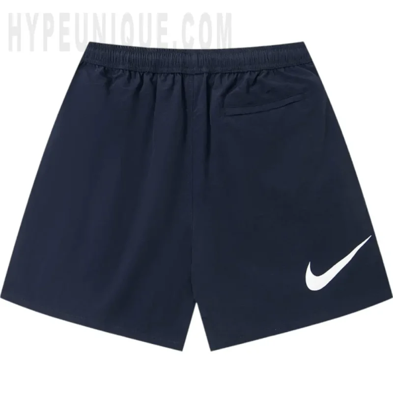 The dark blue shorts