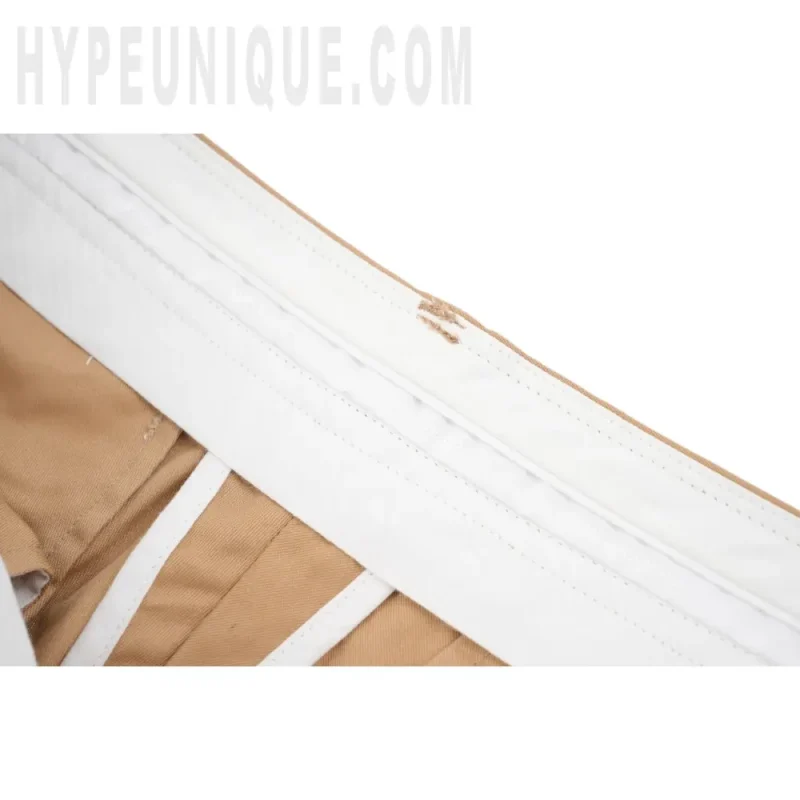 A close up of a white belt