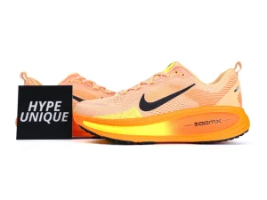 Orange running shoes with vibrant insoles